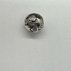 Silver Intricate Metalwork Bracelet charm with Vintage Bohemian Aesthetic